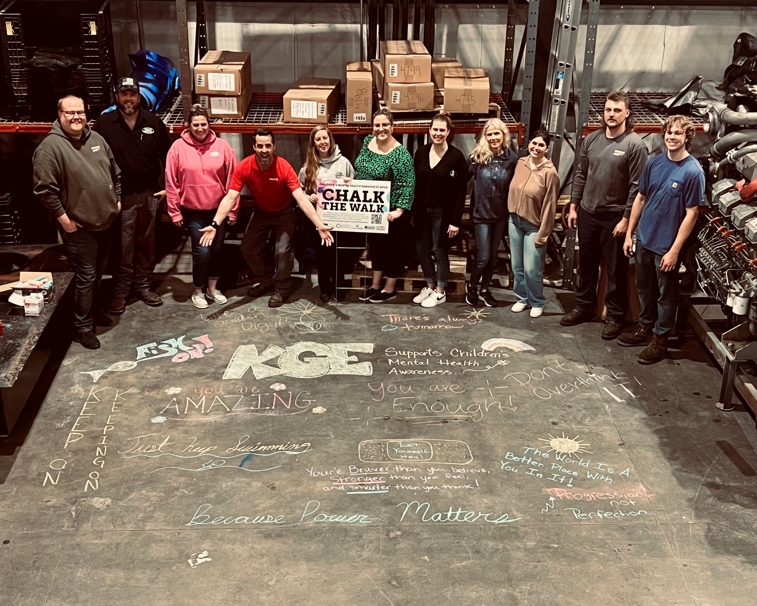 Chalk art on bricks with text "Never back down."